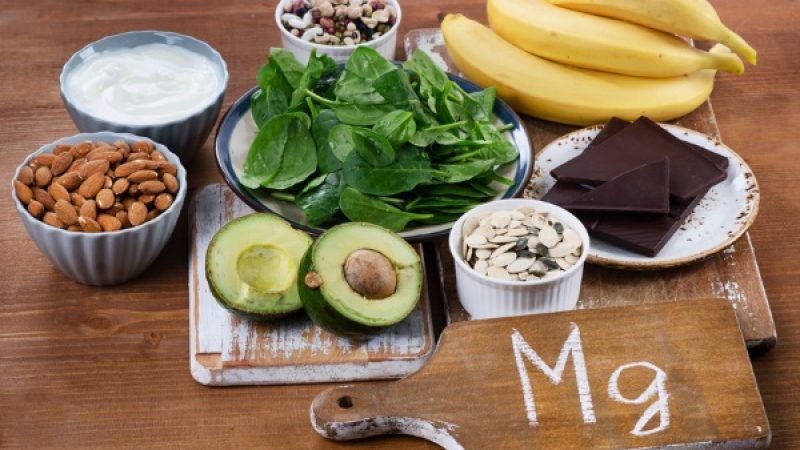 Foods High in Magnesium on  wooden table. Healthy eating.